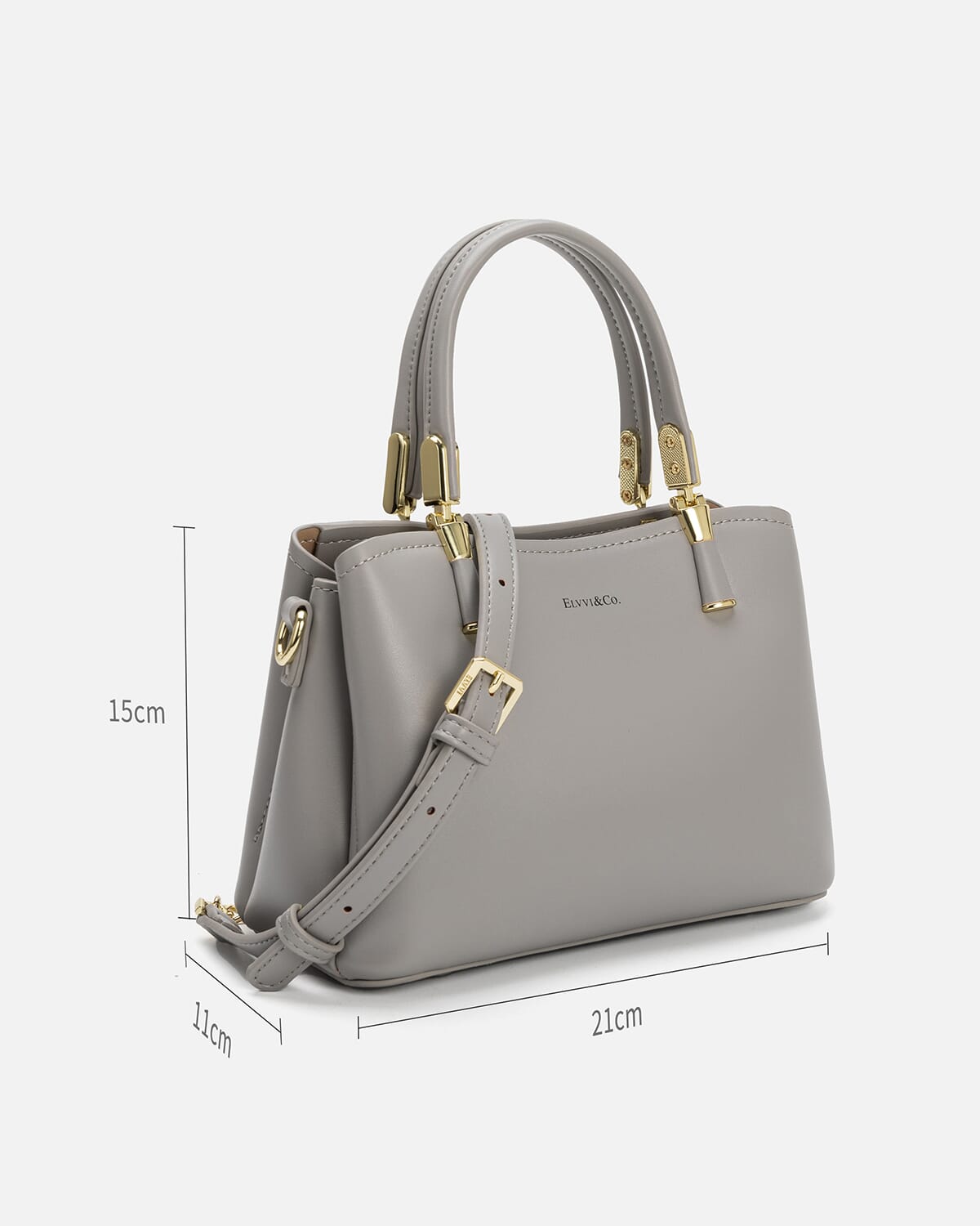 شنطة نسائية من الجلد باللون الرمادي